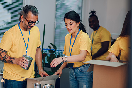 People With Yellow Shirts Working