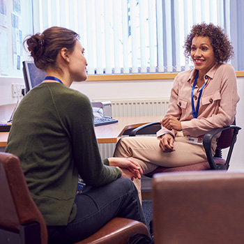 Women Talking in Office